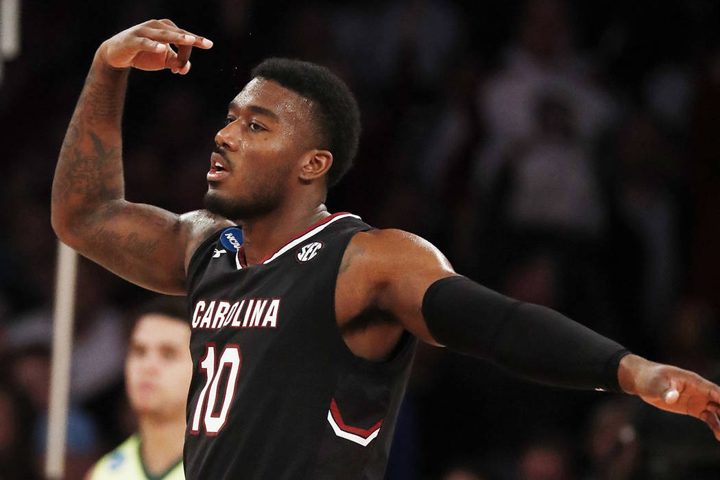South Carolina guard Duane Notice (10) reacts after hitting a 3-point shot against Baylor in the second half of an East Regional semifinal game of the NCAA men's college basketball tournament, Fri ...