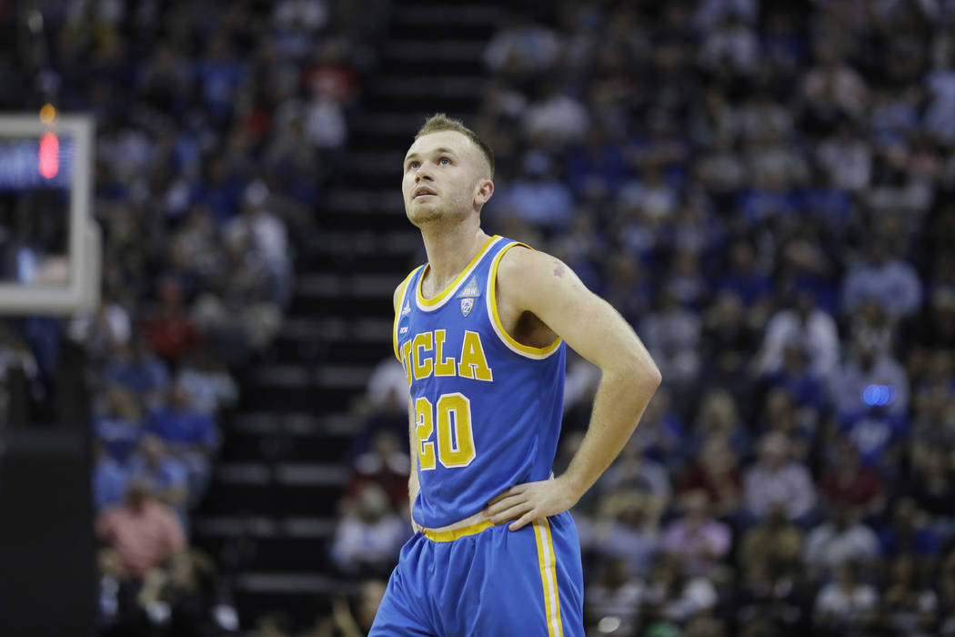 UCLA guard Bryce Alford looks at the scoreboard in the first half of an NCAA college basketball tournament South Regional semifinal game against Kentucky, Friday, March 24, 2017, in Memphis, Tenn. ...