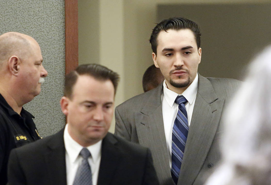 Javier Righetti, right, and his defense attorney Ryan Bashor enter the courtroom at the Regional Justice Center on Tuesday, March 21, 2017, during the penalty phase of Rightetti's murder trial in  ...