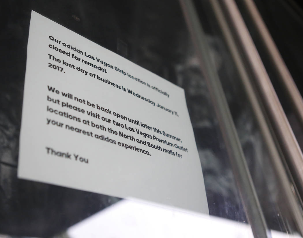 A sign is posted on the door of the the Adidas store, at Showcase Mall, 3785 Las Vegas Boulevard South, to notify customers that they are under construction Friday, March 31, 2017, in Las Vegas. ( ...