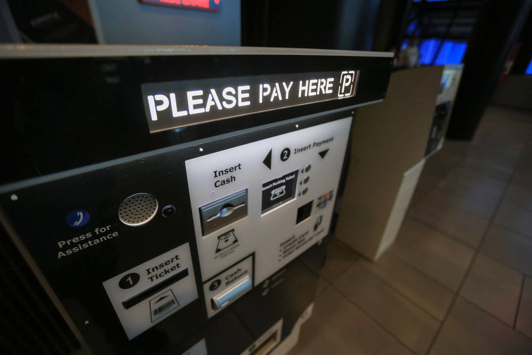 Kiosks inside the Linq hotel-casino allow visitors to pay for parking before leaving the building instead of stopping at a gate to pay in Las Vegas on Thursday, March 30, 2017. Some Caesars Entert ...