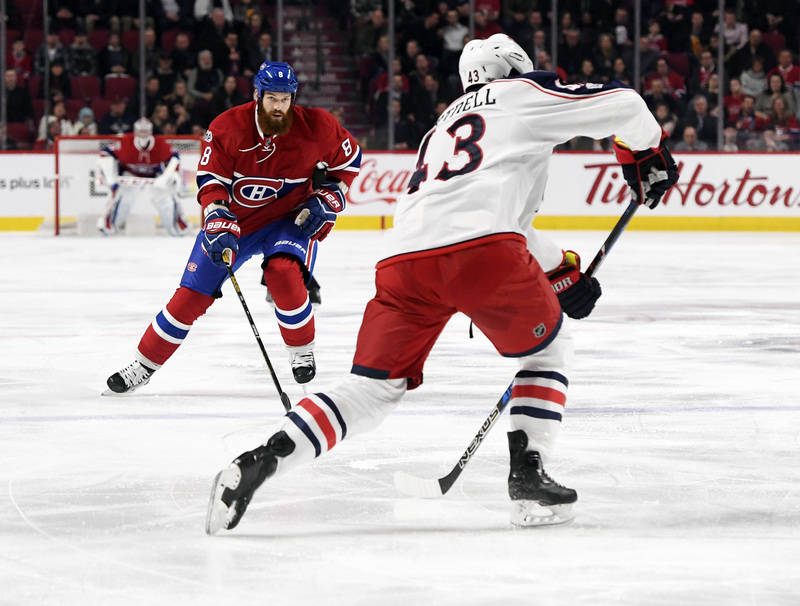 Feb 28, 2017; Montreal, Quebec, CAN; Montreal Canadiens defenseman Jordie Benn (8) defends against Columbus Blue Jackets forward Scott Hartnell (43) during the first period at the Bell Centre. Man ...