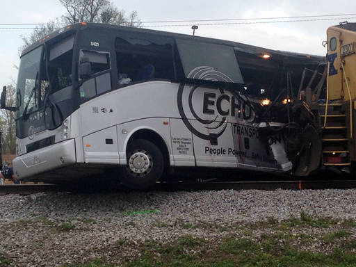 A freight train smashed into a charter bus in Biloxi, Mississippi, on Tuesday, March 7, 2017,  pushing the bus 300 feet down the tracks authorities said. Authorities worked for more than an hour t ...