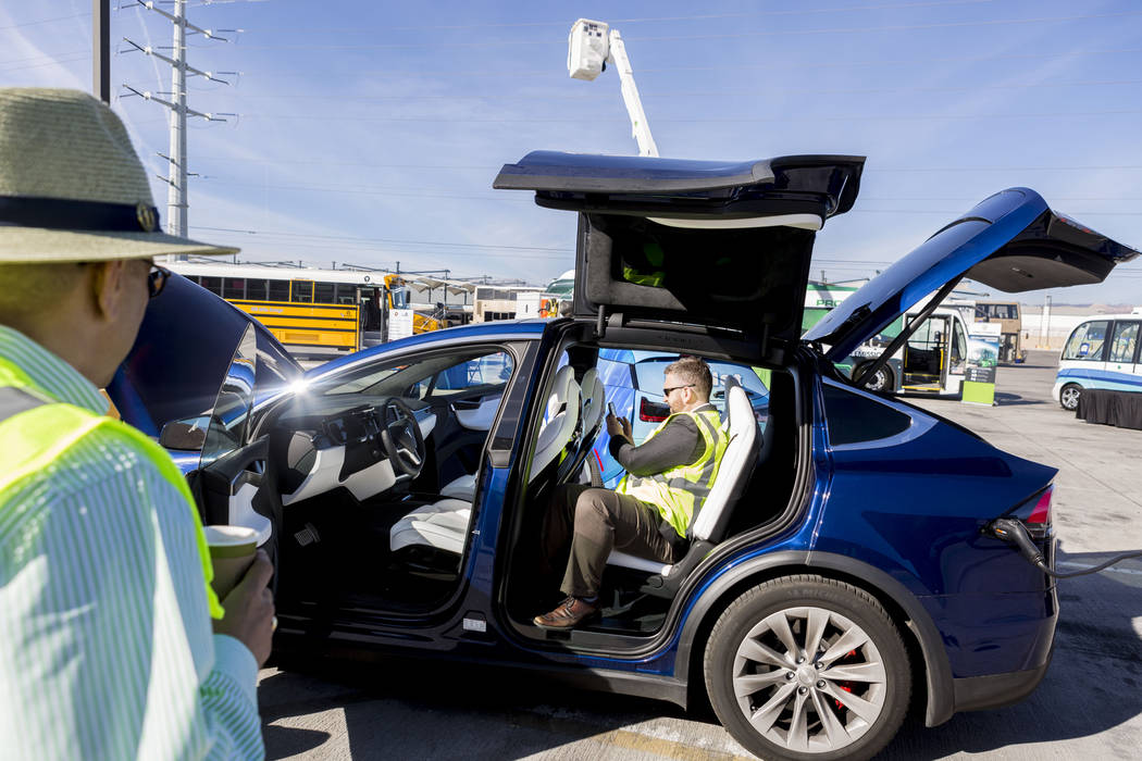 Daniel Fazekas, senior regional planner of Southern Nevada Strong, sits in a Model X Tesla SUV crossover at the Regional Transportation Commission of Southern Nevada Training Center, Wednesday, Ma ...