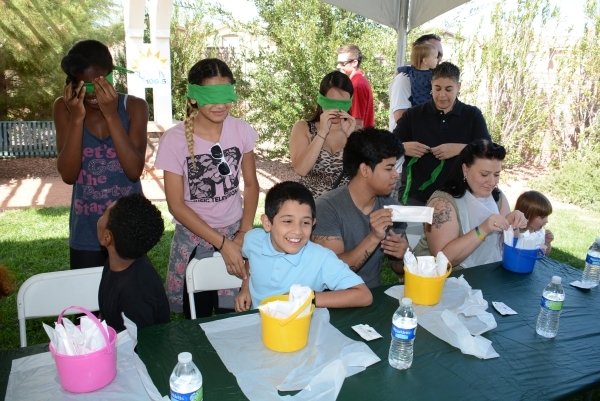 Kids get ready for an ice cream-eating contest at the Sunny 106.5 Ice Cream Sunday. There will be contests for adults and kids at the free event on Sept. 27 at the new Huckleberry Park in Providen ...