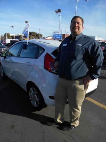 Friendly Ford Used Car Manager Art Muro oversees the Ford certified pre-owned vehicles at the dealership situated at 660 N. Decatur Blvd. He is shown with a 2015 Ford Fiesta. COURTESY