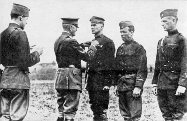 General John J. Pershing, second from left, pins Brig. Gen. Douglas MacArthur with Distinguished Service Cross in 1918. Charles T. Menoher, left, reads citation. Leach, fourth from left, and Willi ...