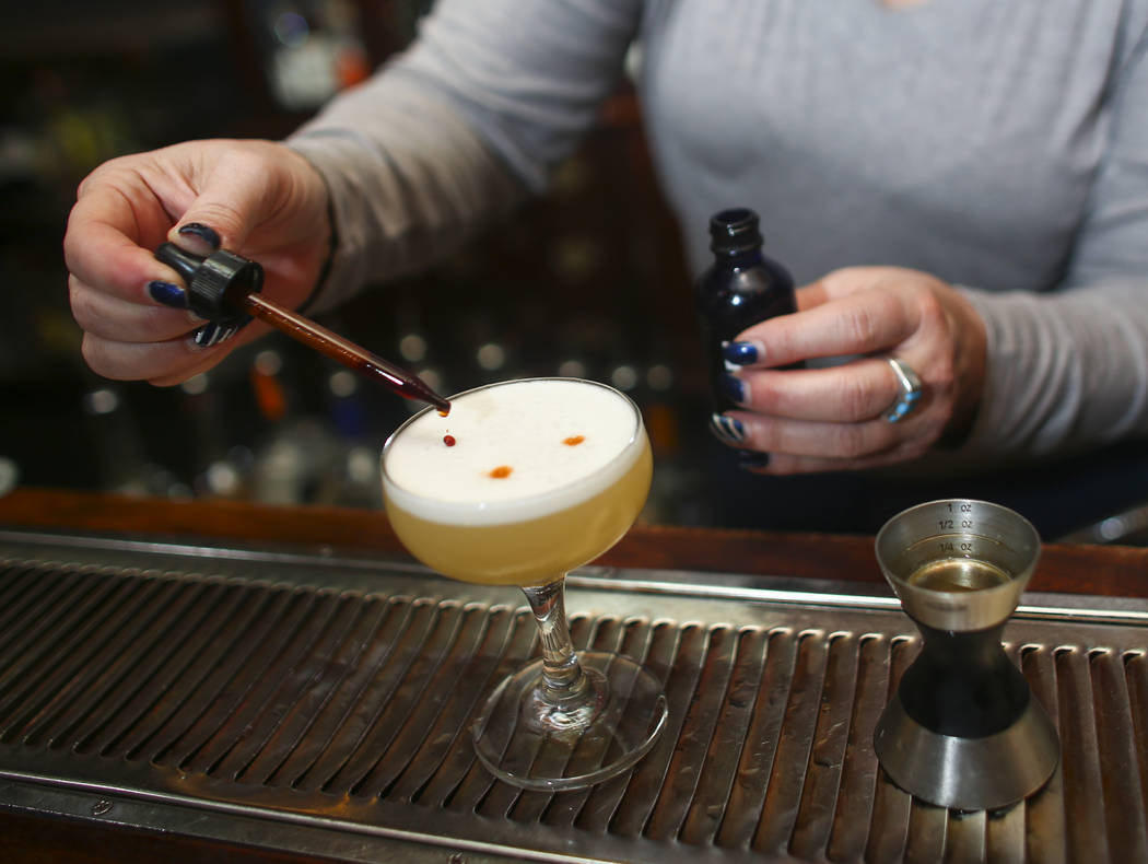 Sharon Bond puts the finishing touches on a whiskey sour during a cocktail class at Velveteen Rabbit in downtown Las Vegas on Saturday, Feb. 25, 2017. (Chase Stevens/Las Vegas Review-Journal) @css ...