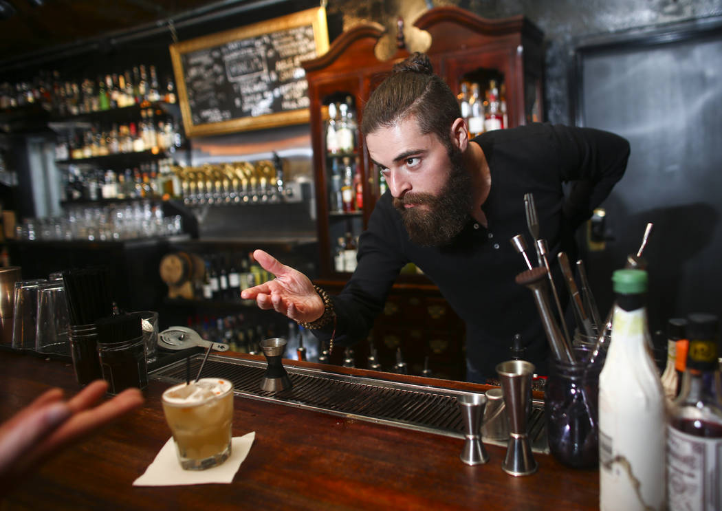 Jason Bornstein presents a finished whiskey sour during a cocktail class at Velveteen Rabbit in downtown Las Vegas on Saturday, Feb. 25, 2017. (Chase Stevens/Las Vegas Review-Journal) @csstevensphoto