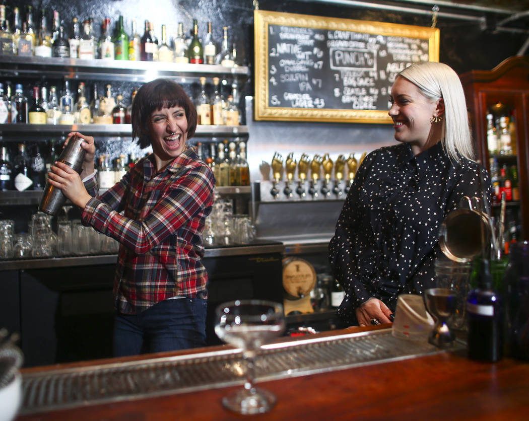 Heather Toledo, left, makes a whiskey sour as instructor Pamela Dylag looks on during a cocktail class at Velveteen Rabbit in downtown Las Vegas on Saturday, Feb. 25, 2017. (Chase Stevens/Las Vega ...
