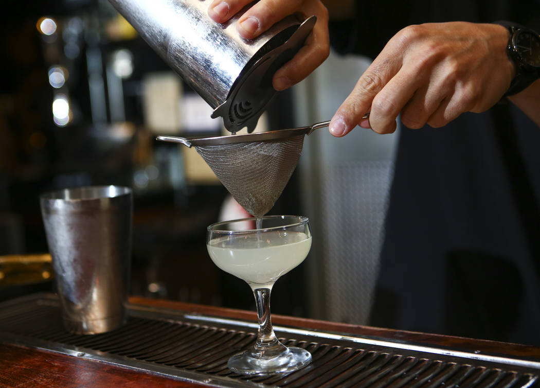 Bill Yadao makes a French 75 during a cocktail class at Velveteen Rabbit in downtown Las Vegas on Saturday, Feb. 25, 2017. (Chase Stevens/Las Vegas Review-Journal) @csstevensphoto