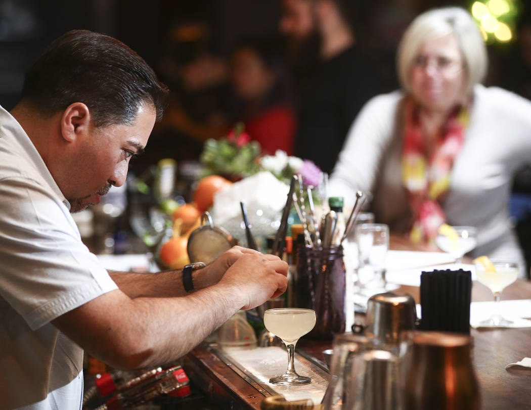 James Sandoval makes a French 75 during a cocktail class at Velveteen Rabbit in downtown Las Vegas on Saturday, Feb. 25, 2017. (Chase Stevens/Las Vegas Review-Journal) @csstevensphoto
