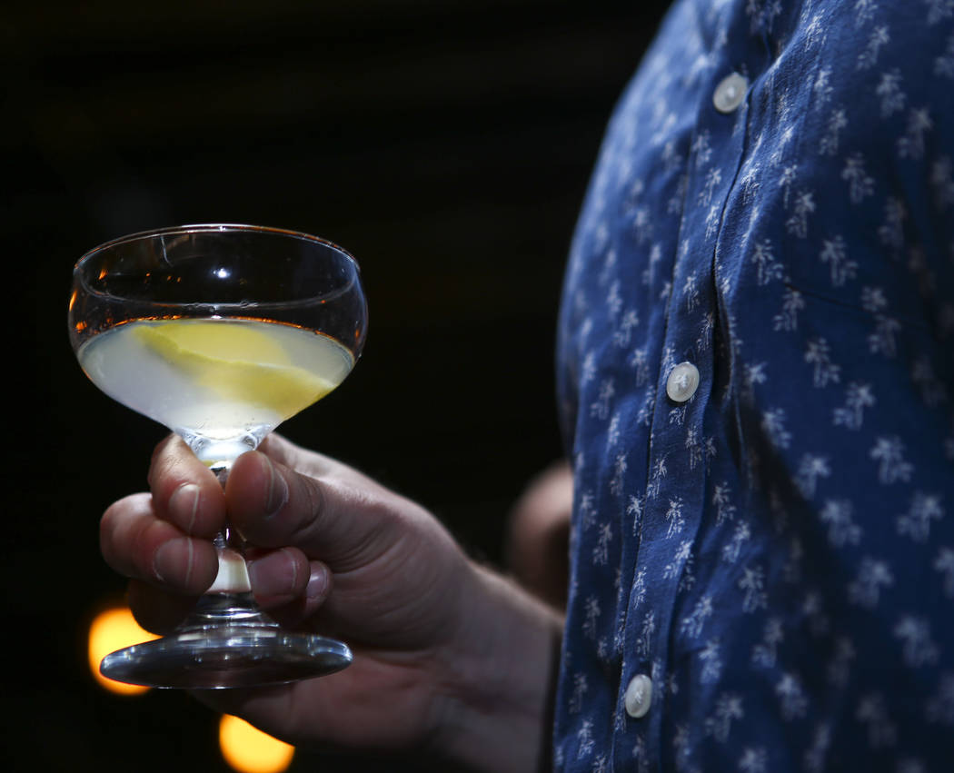 Emmett Stone holds a glass of French 75 during a cocktail class at Velveteen Rabbit in downtown Las Vegas on Saturday, Feb. 25, 2017. (Chase Stevens/Las Vegas Review-Journal) @csstevensphoto