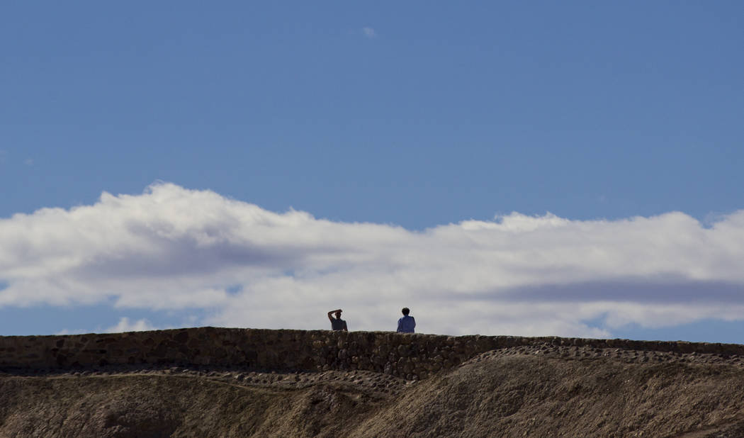 People at Zabriskie Point in Death Valley National Park on Tuesday, Feb. 28, 2017. The cover art of rock band U2's "The Joshua Tree" was taken at the popular tourist spot at the ...