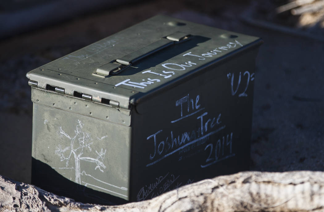The remains of the tree featured in the album artwork of U2's 1987 album "The Joshua Tree" is shown with tributes and memorabilia outside of Death Valley National Park along Cali ...