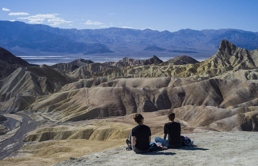 People at Zabriskie Point in Death Valley National Park on Tuesday, Feb. 28, 2017. The cover art of rock band U2's &quot;The Joshua Tree&quot; was taken at the popular tourist spot at the  ...