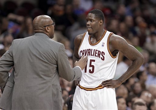 Cleveland Cavaliers coach Mike Brown, left, talks to Anthony Bennett during the third quarter of a game against the San Antonio Spurs on March 4, 2014, in Cleveland. (Mark Duncan/AP)