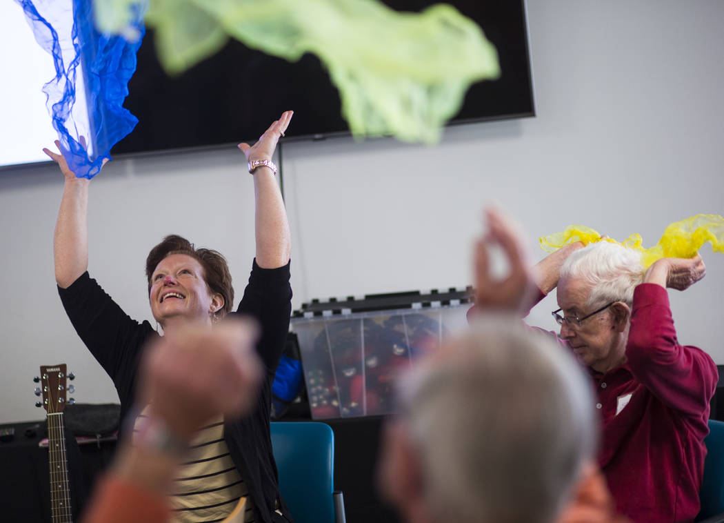 Music therapist Becky Wellman, left, leads a class for patients with memory and movement disorders at the Cleveland Clinic Lou Ruvo Center for Brain Health in Las Vegas on Wednesday, March 29, 201 ...