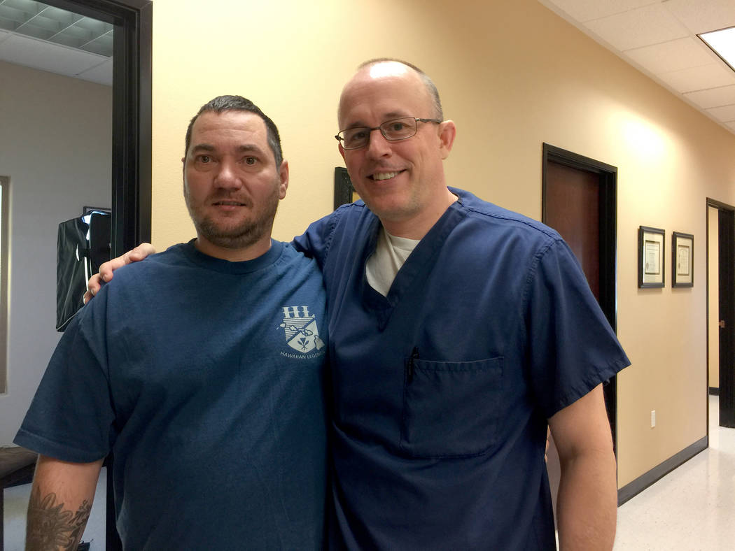 Army veteran Frank Schultz shown with Las Vegas surgeon Dr. Tim Tollestrup, whose 2016 procedures relieved Shultz of years of pain. (Lisa Stark/Special to the Las Vegas Review-Journal)