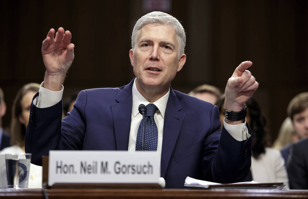 FILE - In this March 22, 2017, file photo, Supreme Court Justice nominee Judge Neil Gorsuch testifies on Capitol Hill in Washington, at his confirmation hearing before the Senate Judiciary Committ ...