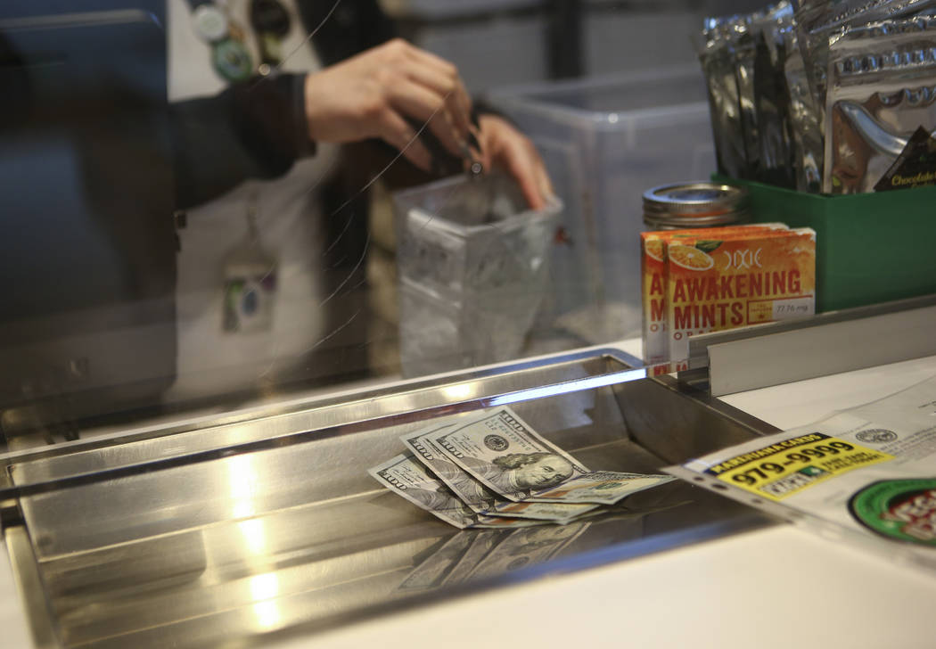 Money for products at medical marijuana dispensary The Source in Las Vegas on Thursday, March 30, 2017. (Chase Stevens/Las Vegas Review-Journal) @csstevensphoto