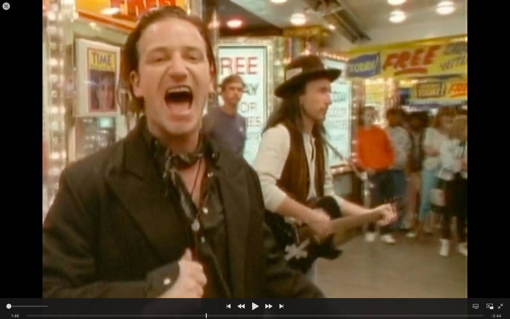 A scene from U2's iconic "I Still Haven't Found What I'm Looking For" video filmed on Fremont Street on April 12, 1987.