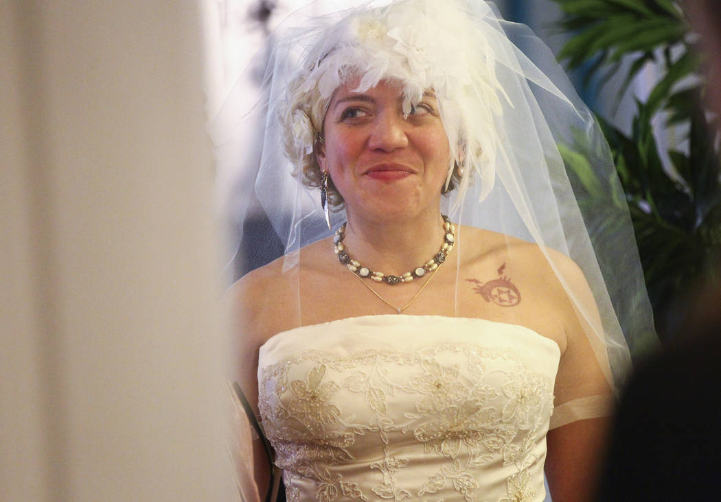 Lauren Santiago prepares to be walked down the aisle in her wedding ceremony at the Little Vegas Chapel in Las Vegas on Saturday, April 1, 2017. (Chase Stevens/Las Vegas Review-Journal) @csstevens ...