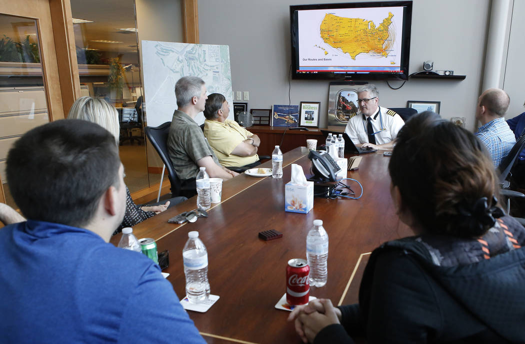 People gather for the initial training that would allow Grand Canyon Scenic Airlines pilots to join Allegiant Air once they receive the experience at the Boulder City Municipal Airport on Wednesda ...