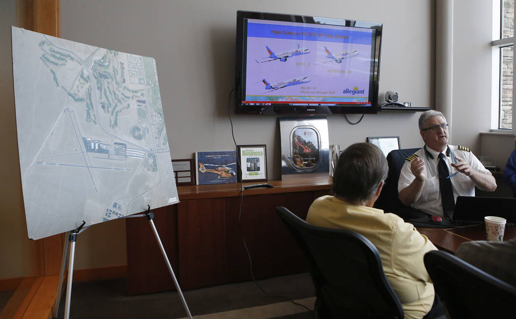 Ernie Nevin, the Western Region chief pilot for Allegiant Air, left, speaks to Grand Canyon Scenic Airline pilots at the Boulder City Municipal Airport on Wednesday, April 5, 2017, in Boulder City ...
