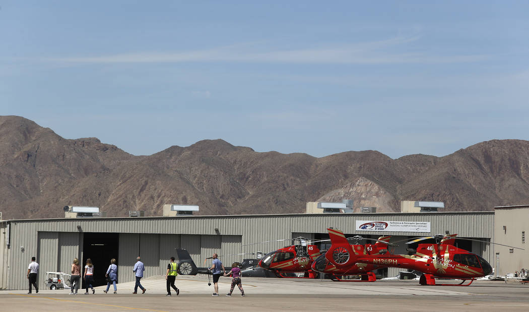 Passengers prepare to board a Grand Canyon Scenic Airline helicopter at the Boulder City Municipal Airport on Wednesday, April 5, 2017, in Boulder City. Christian K. Lee Las Vegas Review-Journal @ ...