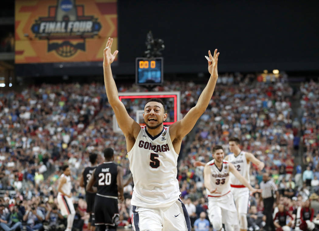 Gonzaga's Nigel Williams-Goss (5) celebrates after the semifinals of the Final Four NCAA college basketball tournament against South Carolina, Saturday, April 1, 2017, in Glendale, Ariz. Gonzaga w ...