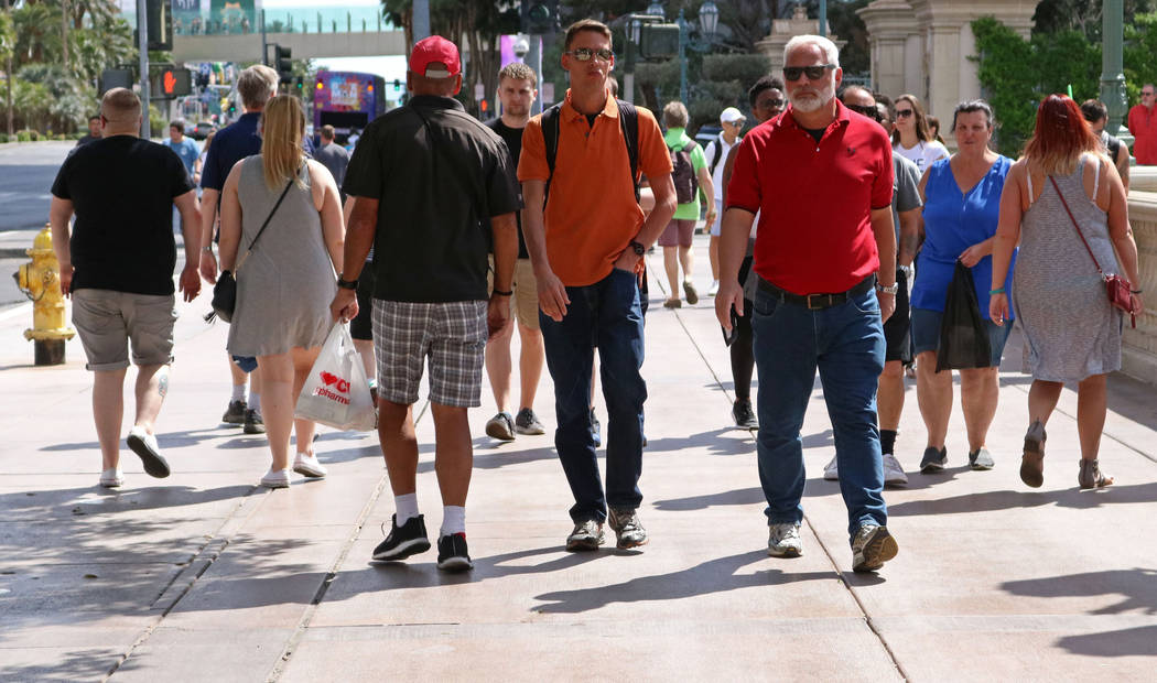 Pedestrians walk past the Bellagio hotel-casino, Wednesday, April 5, 2017 in Las Vegas. (Gabriella Benavidez Las Vegas Review-Journal) @gabbydeebee