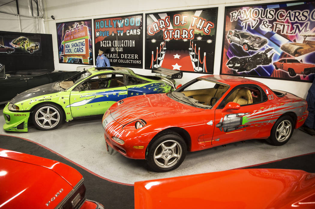 The 1996 Mitsubishi Eclipse, left, and the 1993 Mazda RX-7 featured in the first of the Fast and the Furious movie series at the Hollywood Cars Museum on Tuesday, April, 4, 2017, at Hot Rod City,  ...