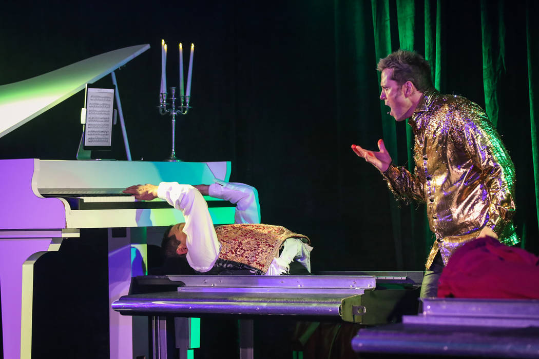 Talk about division of labor. Raja can play piano even after coming out on the bad end of Jarrett's sawing-in-half illusion. (Jesse Lambert/Arch Angel Studios)