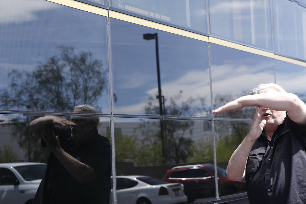 Thomas Gleason, 70, explains the mechanics of his solar panel wall on Thursday, April 6, 2017, in North Las Vegas. Gleason says he submitted a bid to build President Donald Trump's proposed border ...