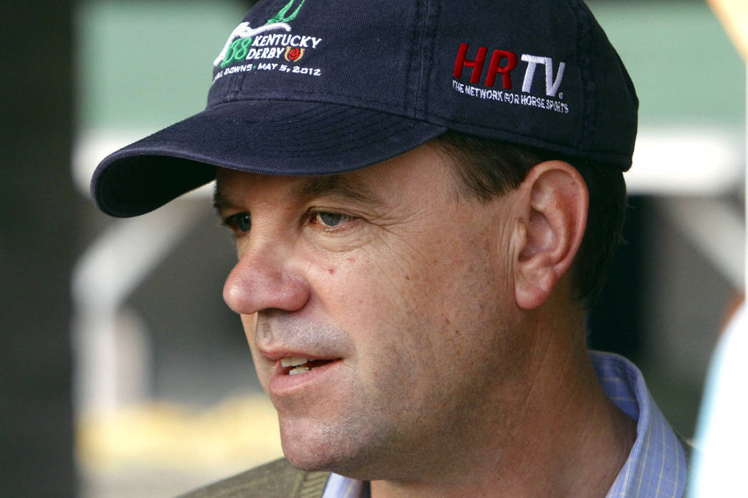 H. Graham Motion, trainer of fourth-place Kentucky Derby finisher Went the Day Well, speaks to reporters at Churchill Downs in Louisville, Ky., Sunday, May 6, 2012. (AP Photo/Garry Jones)
