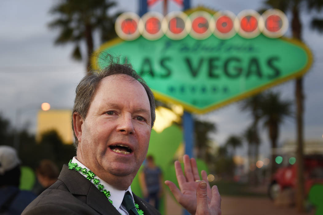 LVCVA Vice President of Global Business Sales Chris Meyer talks about the &quot;Welcome to Fabulous Las Vegas&quot; sign as it is turned green in honor of St. Patrick's Day Thursday, March ...