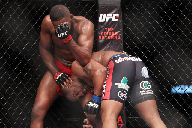 Jon Jones hits Daniel Cormier with an elbow during their fight at UFC 182 Saturday, Jan. 3, 2015 at the MGM Grand Garden Arena. Jones won a unanimous decision. (Sam Morris/Las Vegas Review-Journal)