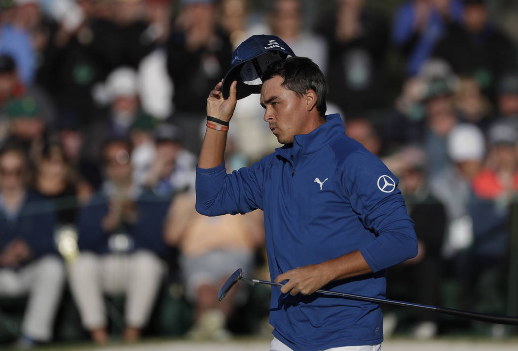 Rickie Fowler tips his hat on the 18th green during the second round of the Masters golf tournament Friday, April 7, 2017, in Augusta, Ga. (Matt Slocum/AP)