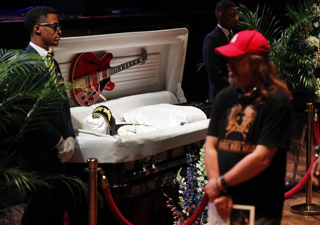 Fans pay their respects to the rock 'n' roll legend Chuck Berry during a public viewing Sunday, April 9, 2017, in St. Louis. The man behind such classics as "Johnny B. Goode," ''Sweet Little Sixte ...