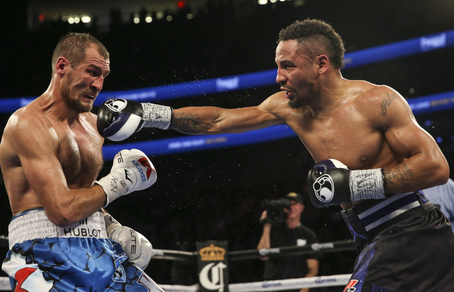 Andre Ward, right, hits Sergey Kovalev during their light heavyweight title boxing match at T-Mobile Arena in Las Vegas on Saturday, Nov. 19, 2016. Ward won in a unanimous decision. Chase Stevens/ ...
