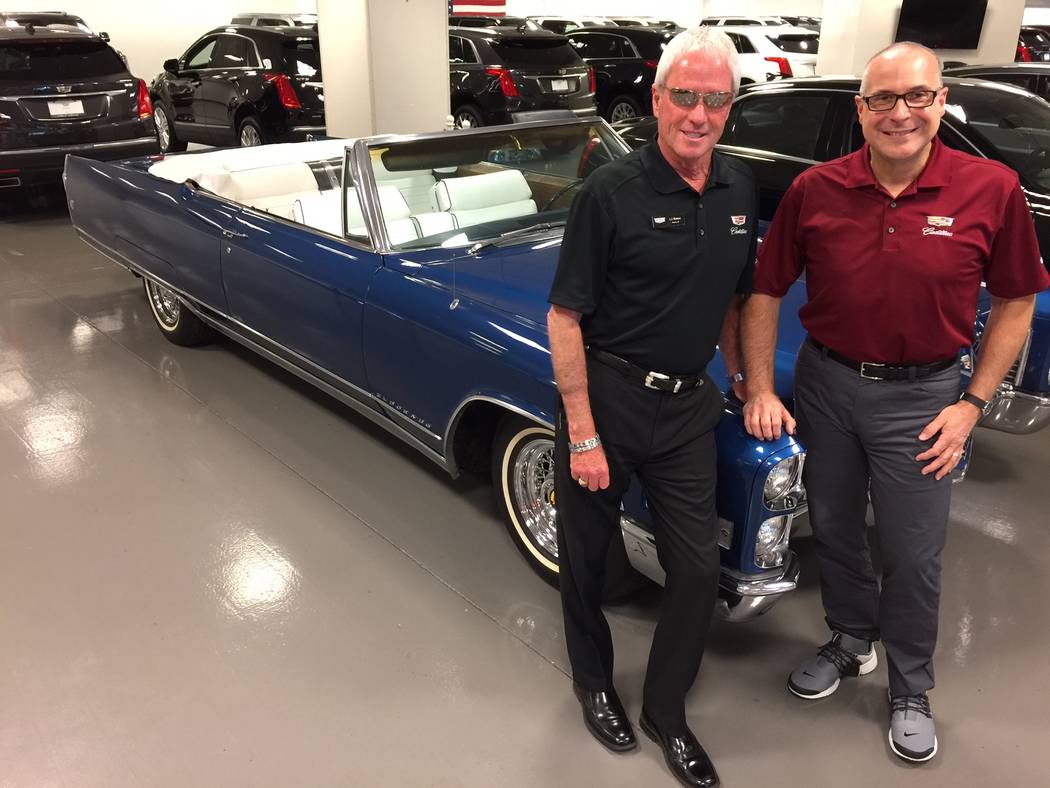 Findlay Automotive
Entertainer and Findlay Cadillac marketing/promotion director and sales executive L.J. Harness, left, and Findlay Cadillac General Manager John Saksa are seen with a classic Cad ...