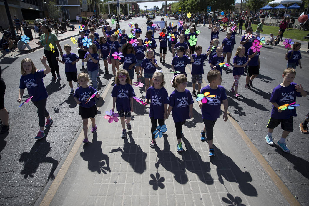Children with the Safekey and Teen Scene program during the annual Henderson Heritage Parade and Festival on Saturday, April 15, 2017, in Henderson. Erik Verduzco Las Vegas Review-Journal @Erik_Ve ...