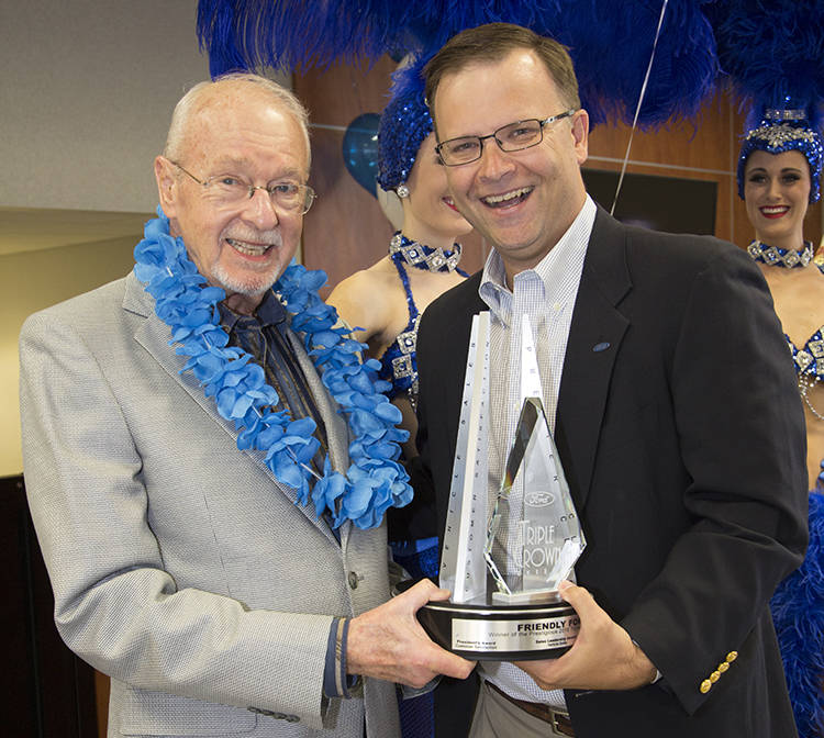 Friendly Ford
Friendly Ford owner Ed Olliges, left, is congratulated by Ford sales operation manager of the Phoenix region Phillip Chancellor, who presented Olliges with the Triple Crown award rec ...