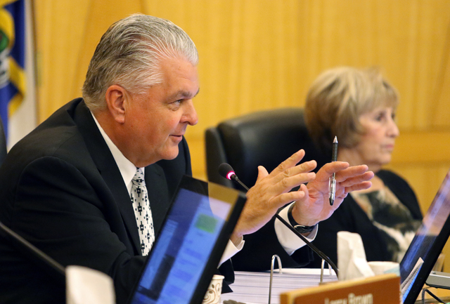 Clark County Commissioner Steve Sisolak speaks responds during public comment regarding Service Employees International Union Local 1107 at the County Commission meeting at Clark County Government ...
