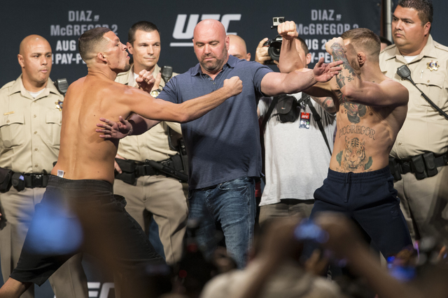 Nate Diaz, left, and Conor McGregor pose during UFC 202 weigh-in at the MGM Grand hotel-casino on Wednesday, Aug. 17, 2016, in Las Vegas. (Erik Verduzco/Las Vegas Review-Journal) Follow @Erik_Verduzco