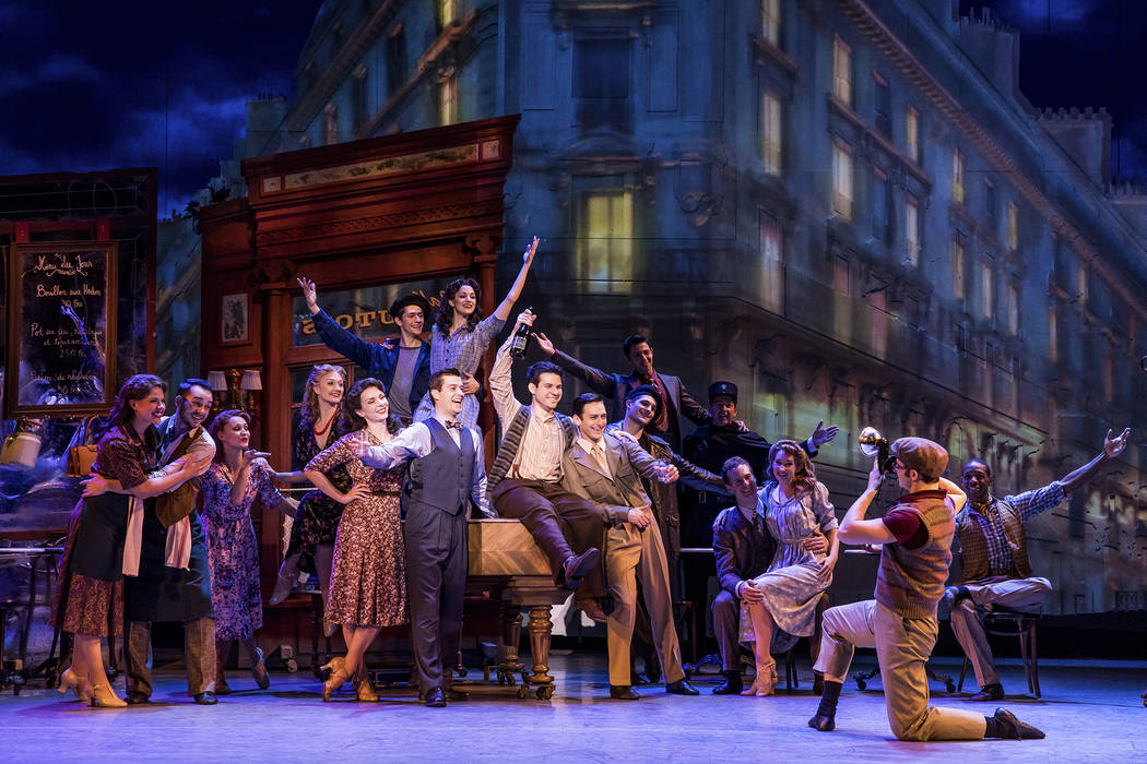 Ex-GIs Adam Hochberg and Jerry Mulligan (Etai Benson, Garen Scribner), center, celebrate their new life in “An American in Paris,” in performance at The Smith Center. (Matthew Murphy The Smith ...