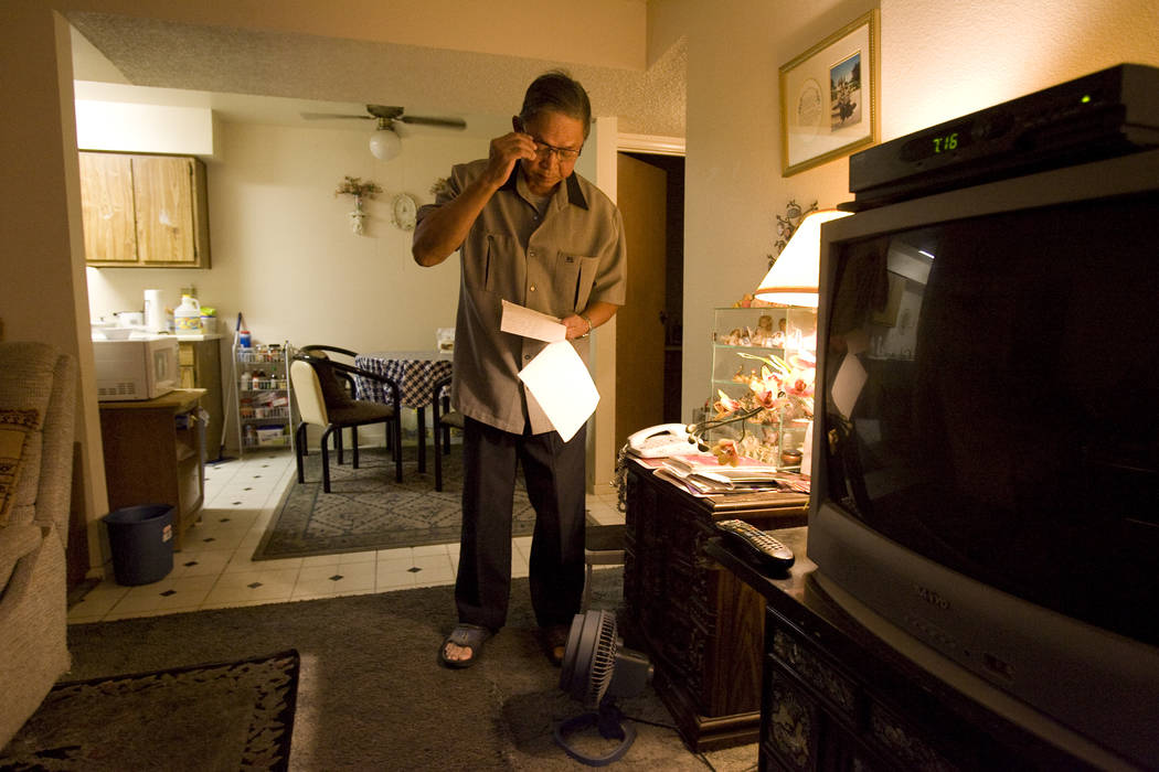 Rodolfo Meana, 73, goes through notes at his Las Vegas apartment Thursday, Aug. 14, 2008, regarding his experience at the Endoscopy Center of Southern Nevada where health authorities say he contra ...
