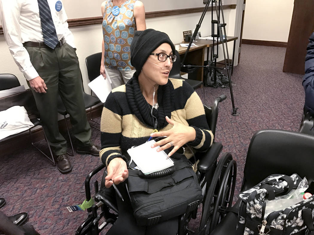Stephanie Packer, a 34-year-old mother of four, talks with reporters after a press conference Wednesday, April 12, 2017, in Carson City. Packer, who has a terminal lung disease and is undergoing c ...