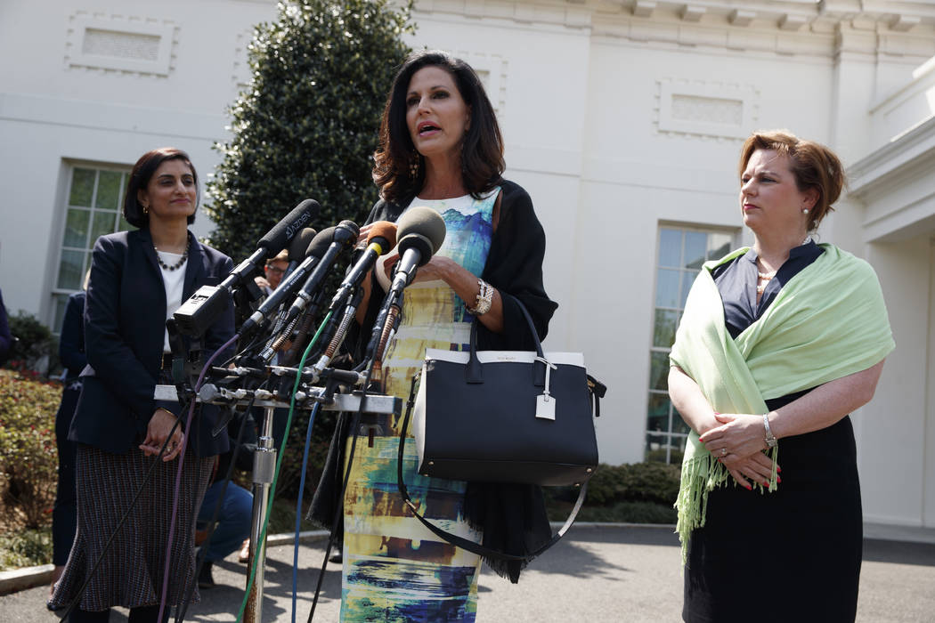 Marjorie Dannenfelser, president of the Susan B. Anthony List, right, and Seema Verma, administrator of the Centers for Medicare and Medicaid Services, left, listen as Penny Nance, CEO of Concerne ...